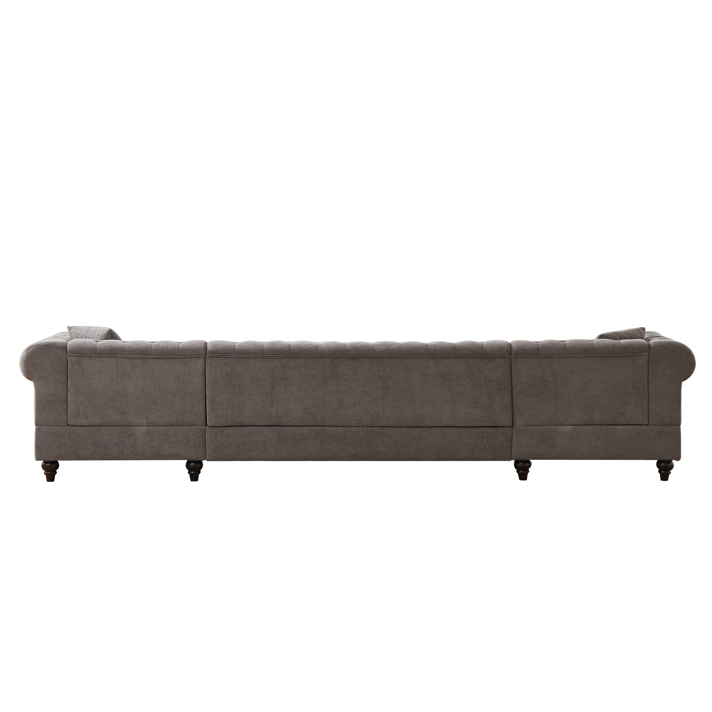 Tufted charcoal grey fabric sofa with rolled arms and dark wooden legs