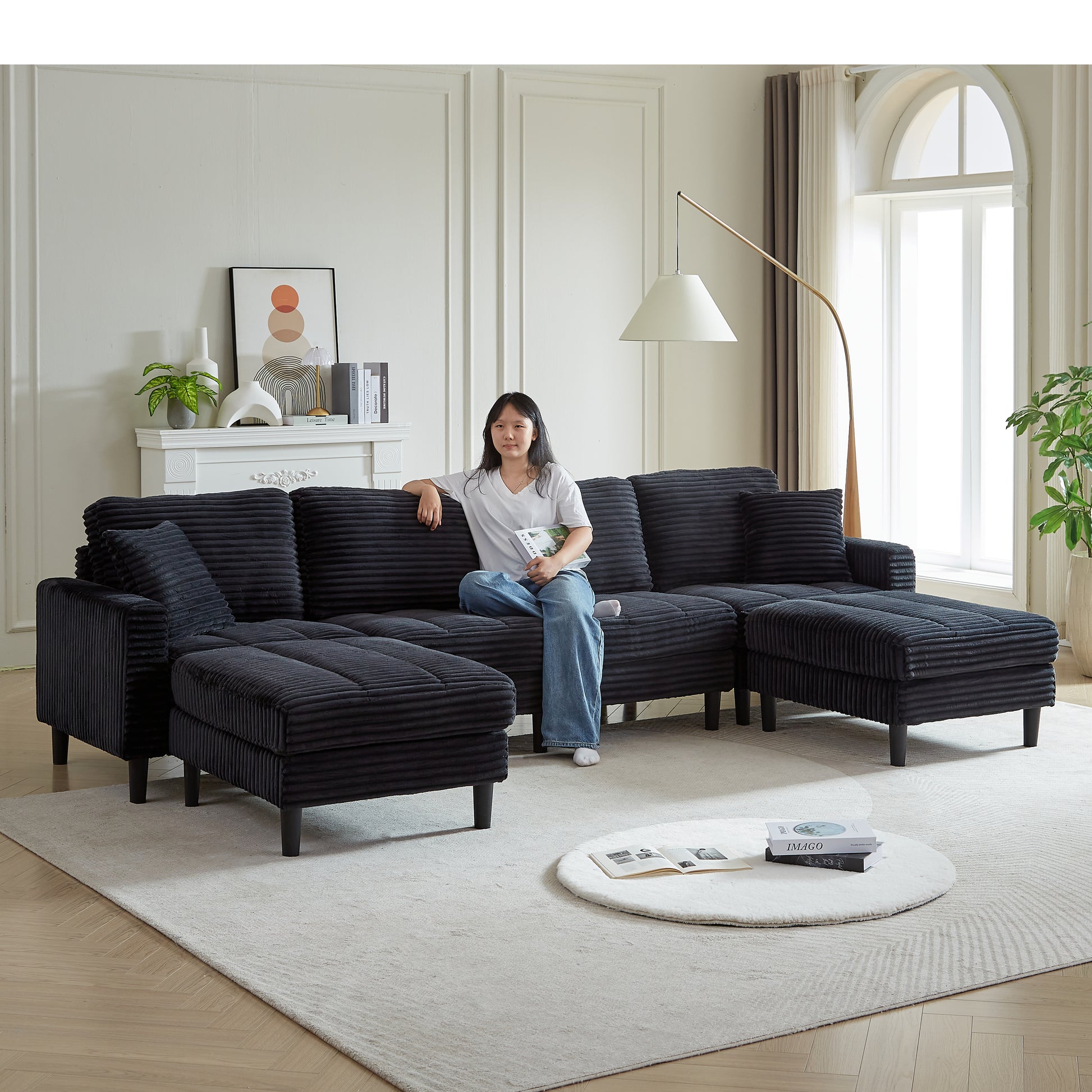 Deep charcoal corduroy sectional sofa with ample seating perfect for modern living rooms