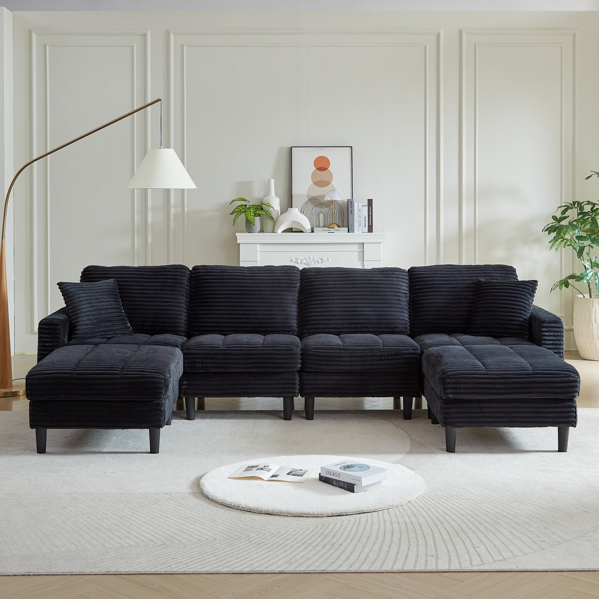 Deep black corduroy sectional sofa with chaise lounges offering plush comfort and modern style