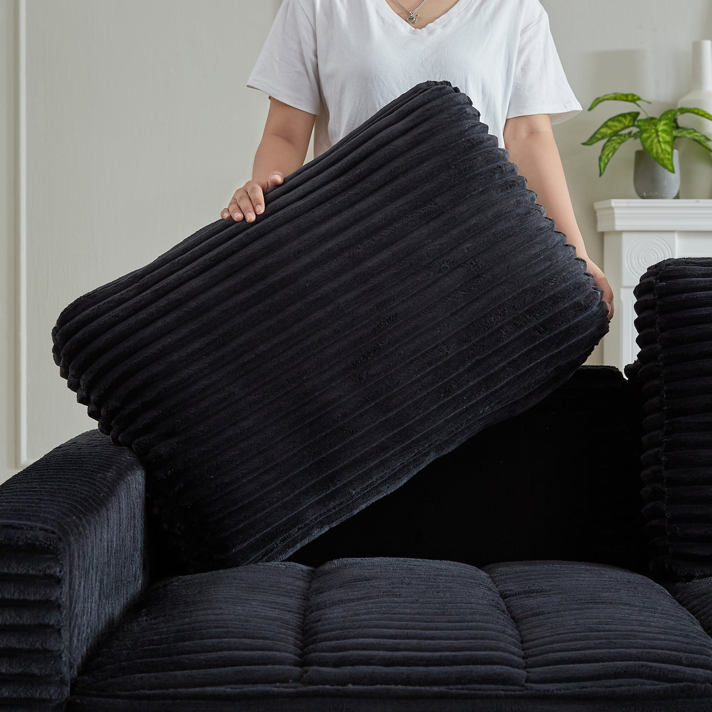 Black corduroy pillow with plush texture ideal for modern living room decor