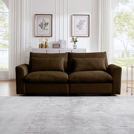 Brown corduroy sofa with plush cushions and wooden legs perfect for living rooms