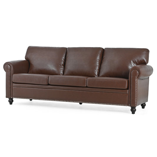 Classic brown leather Chesterfield sofa with tufted back and nailhead trim ideal for a living room