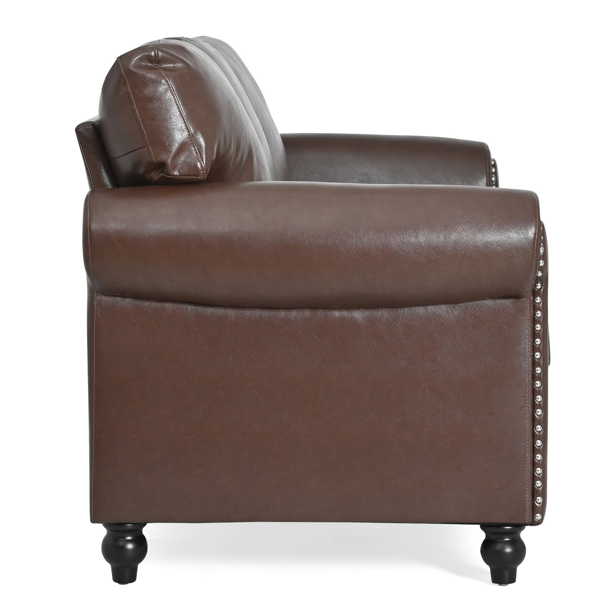 Brown faux leather armchair with rolled arms and silver nailhead trim