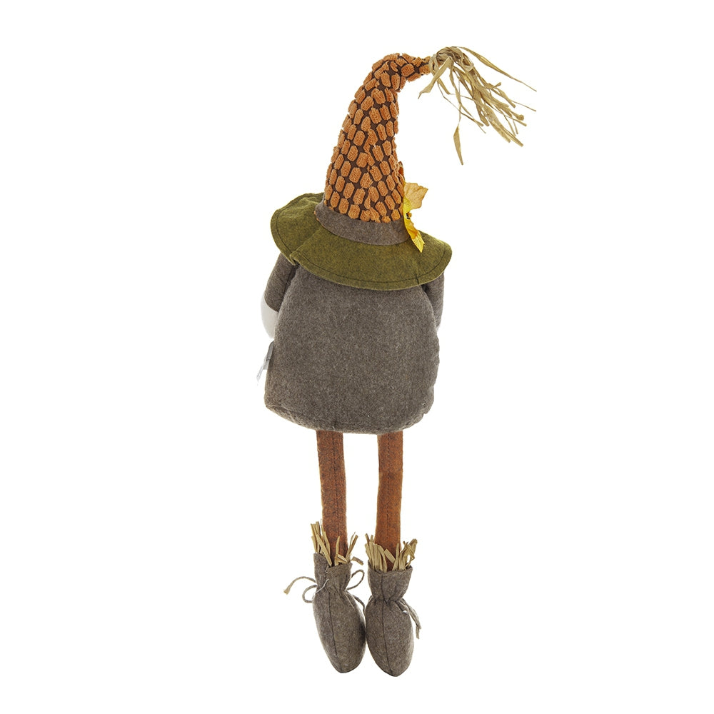 Plush decorative scarecrow with orange textured hat and green collar
