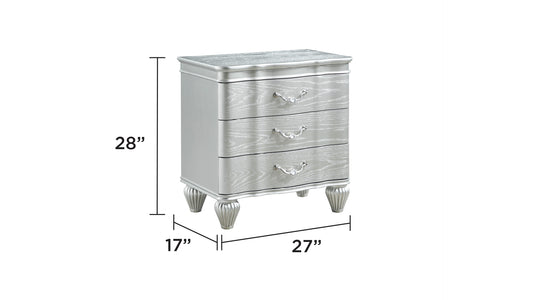 Silver threedrawer nightstand with ornate crystal pulls and carved legs
