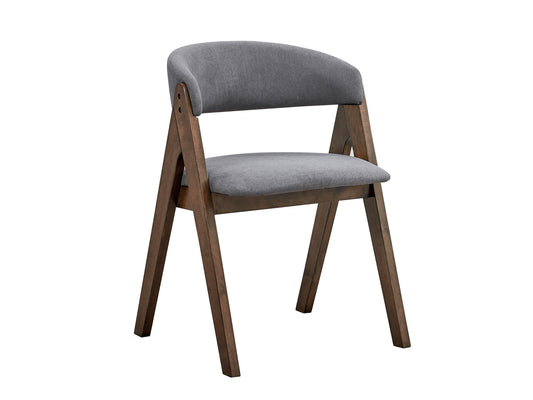 Gray upholstered dining chair with dark wood legs