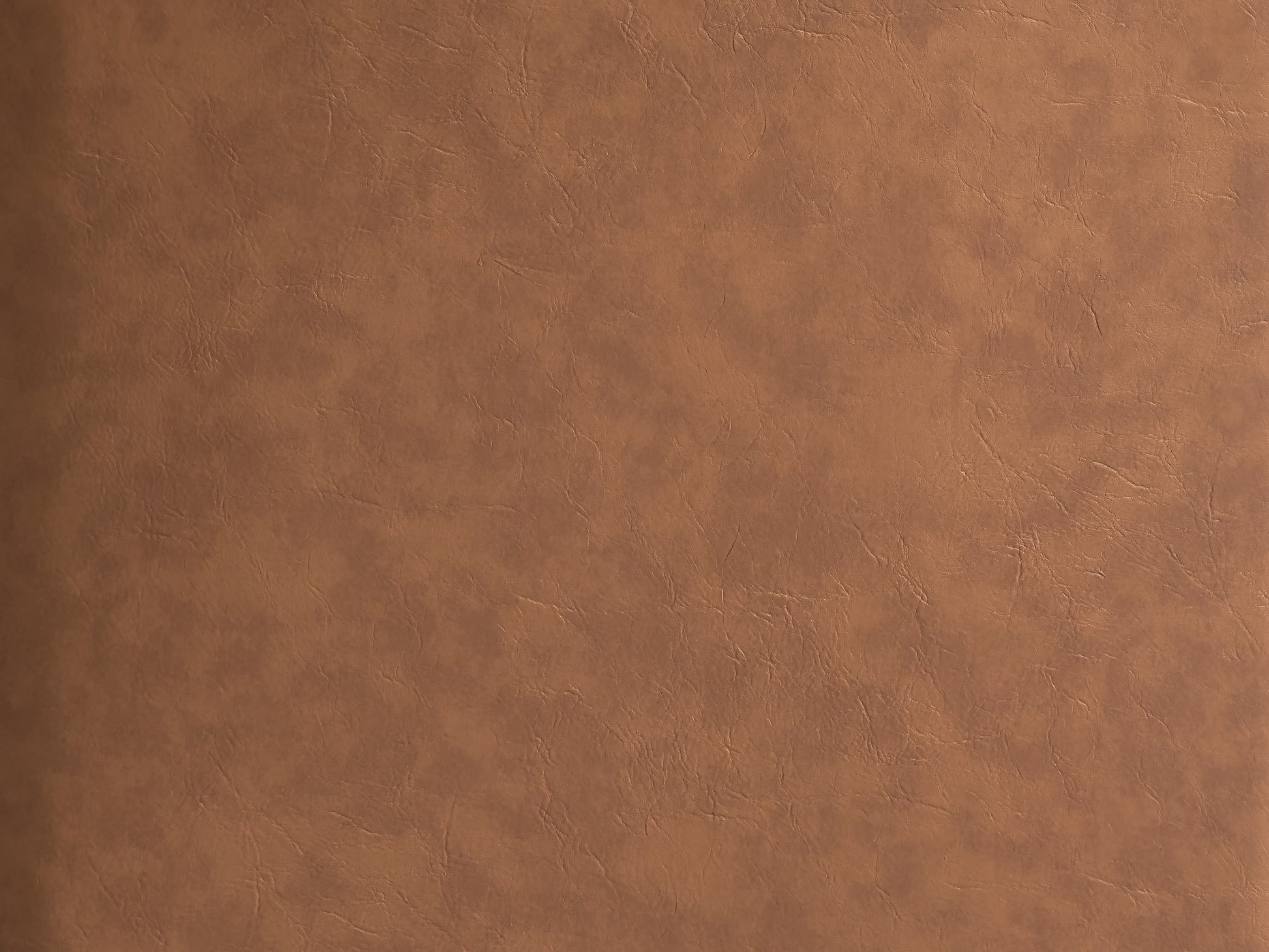 Textured brown vegan leather fabric for upholstery and crafting
