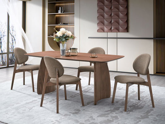Modern walnut dining table with four upholstered chairs on a textured rug