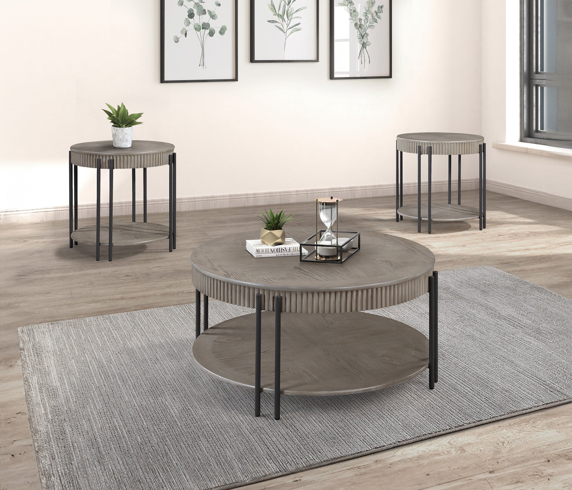 Rustic gray round coffee table with a slatted wood top and lower shelf complementing a modern living room