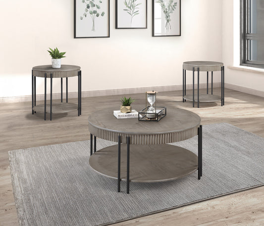 Rustic gray round coffee table with a slatted wood top and lower shelf complementing a modern living room