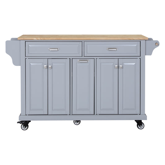 Gray kitchen island with butcher block top and silver hardware