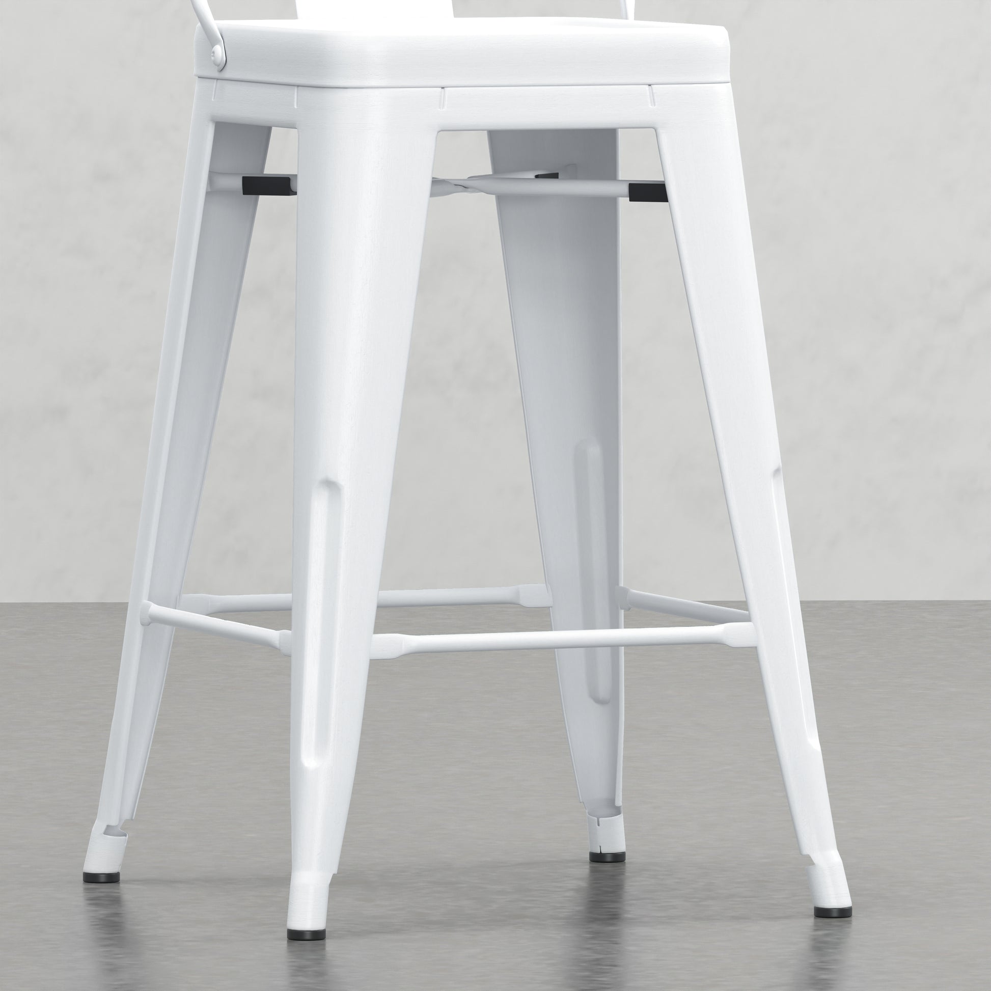 White metal bar stool with a distressed finish and a footrest
