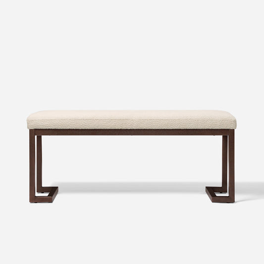 Cream boucle upholstered bench with dark bronze metal legs