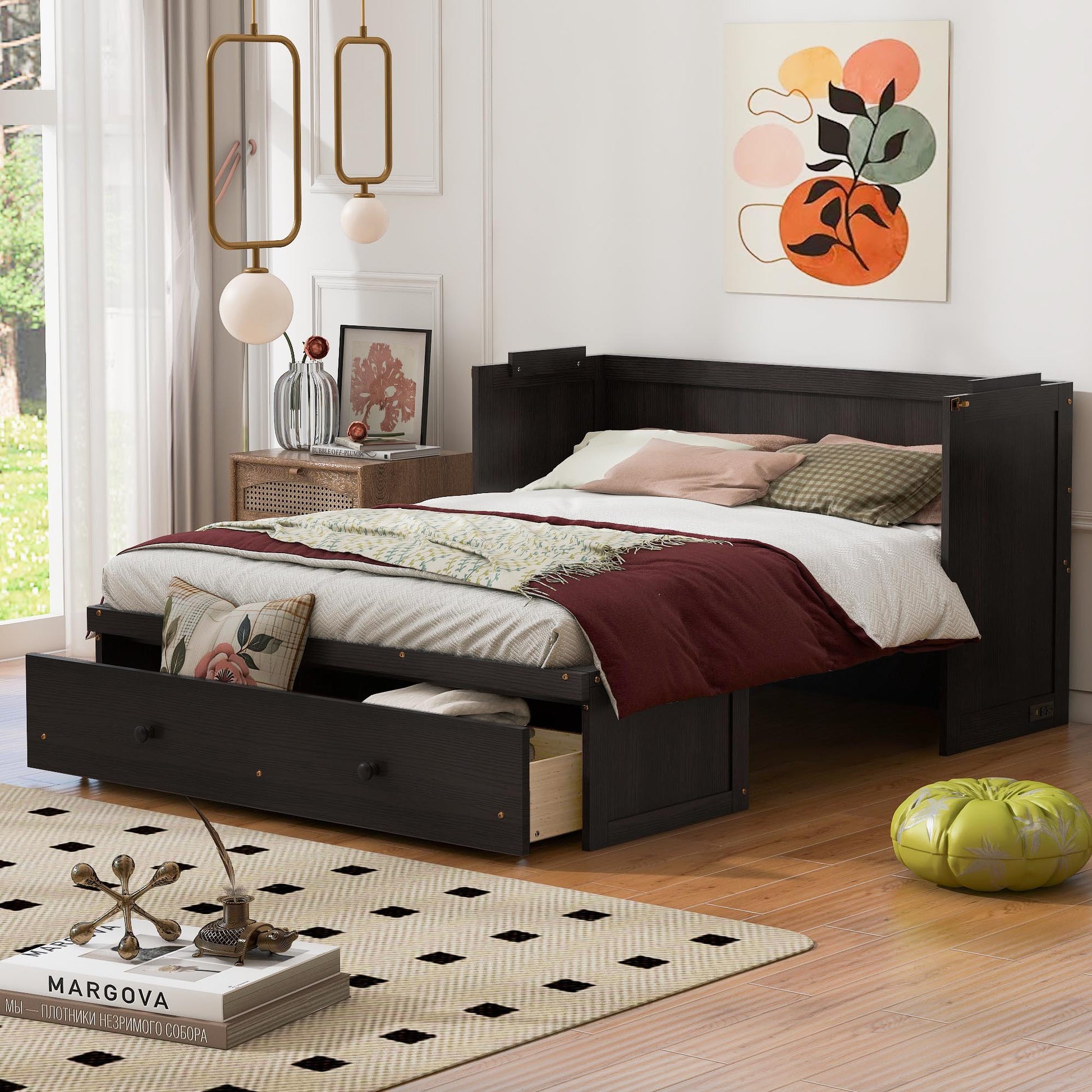 Dark espresso daybed with two storage drawers and plush bedding