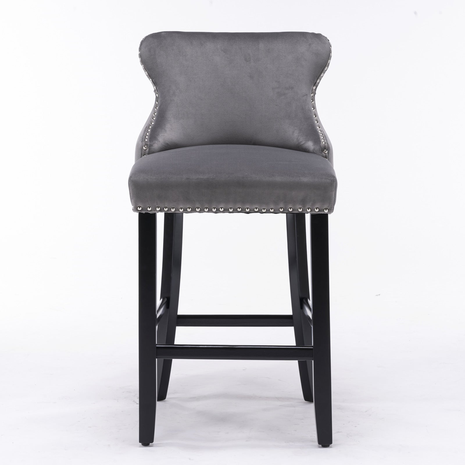 Grey velvet counter stool with silver nailhead trim and black wooden legs