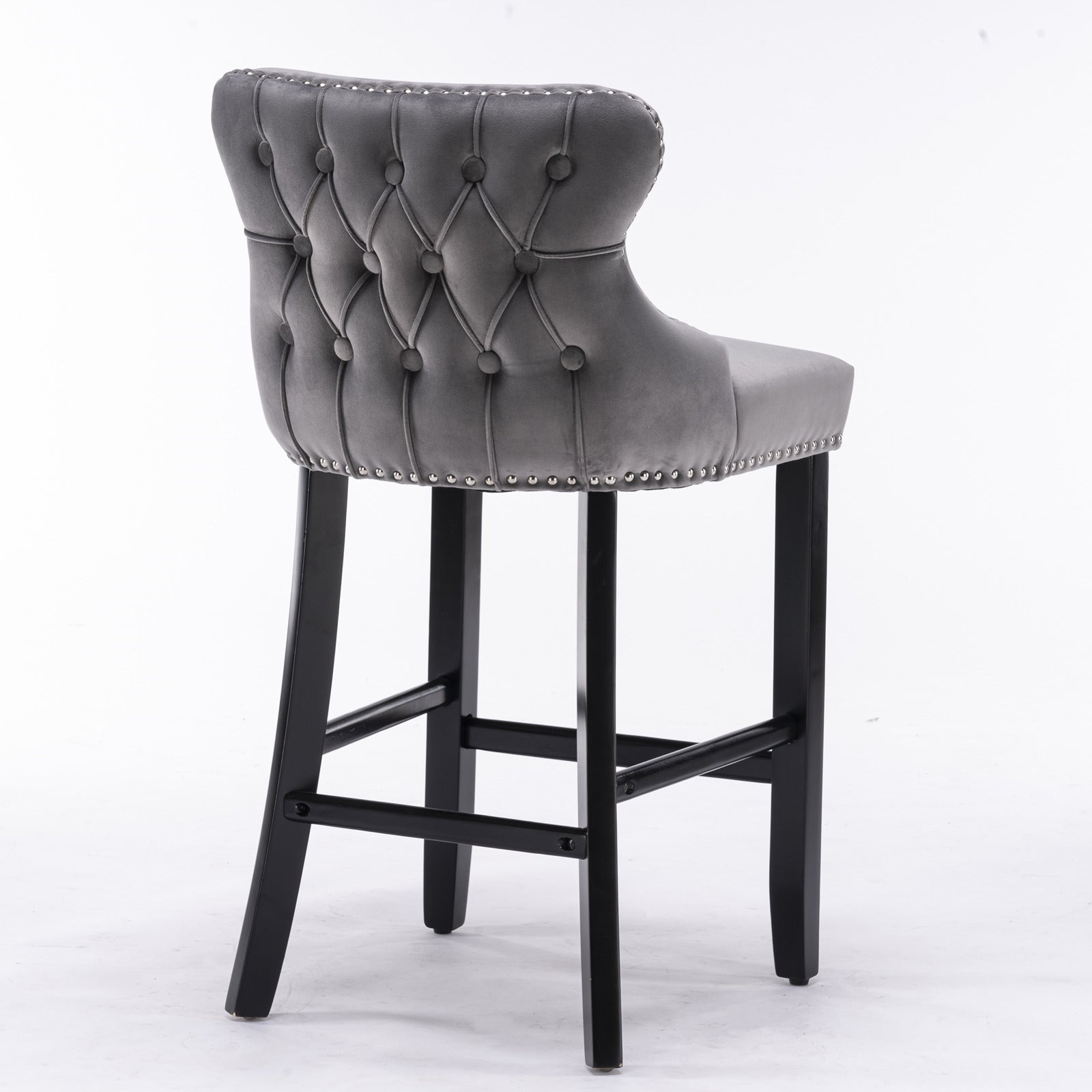 Grey velvet tufted bar stool with silver nailhead trim