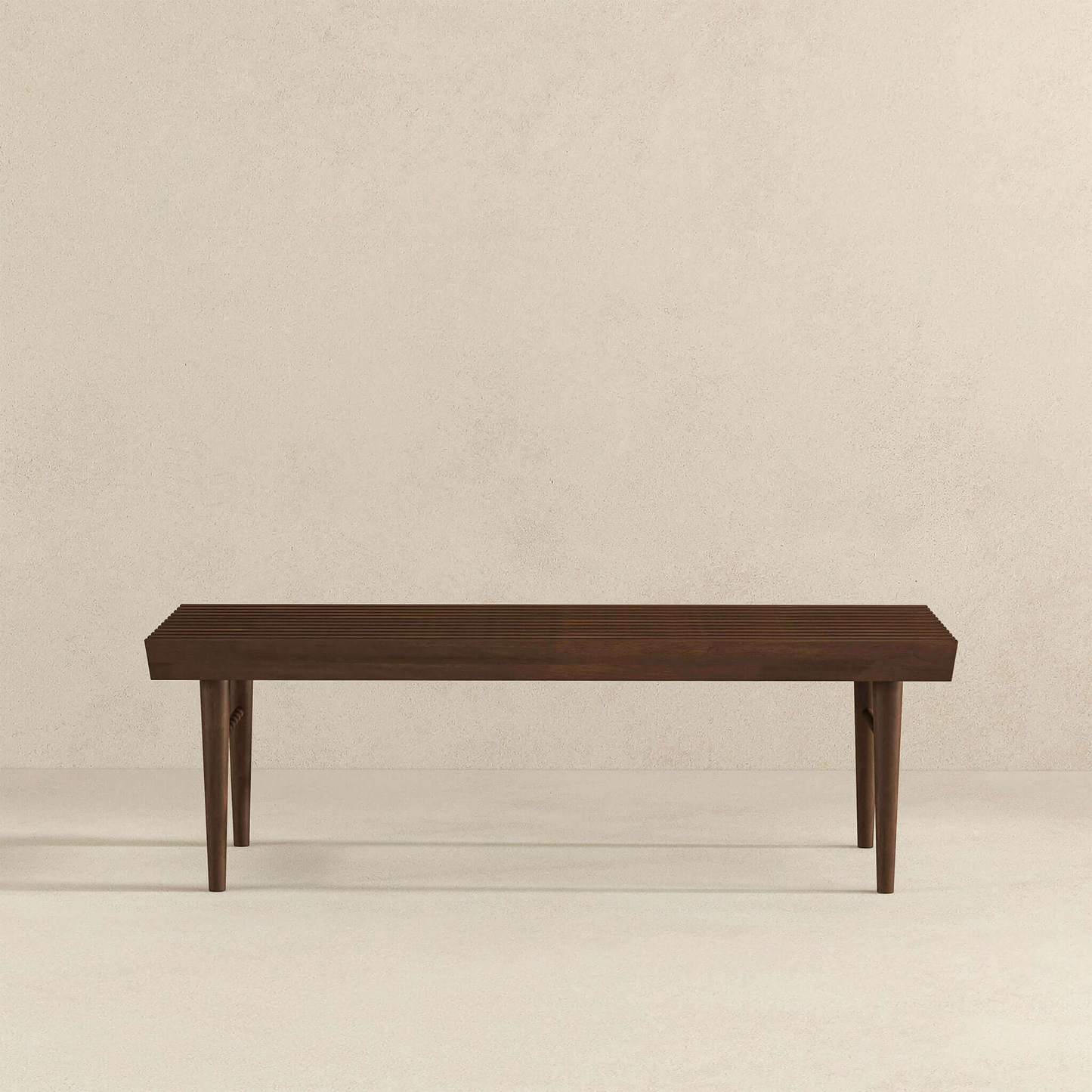 Dark wood slatted bench with tapered legs