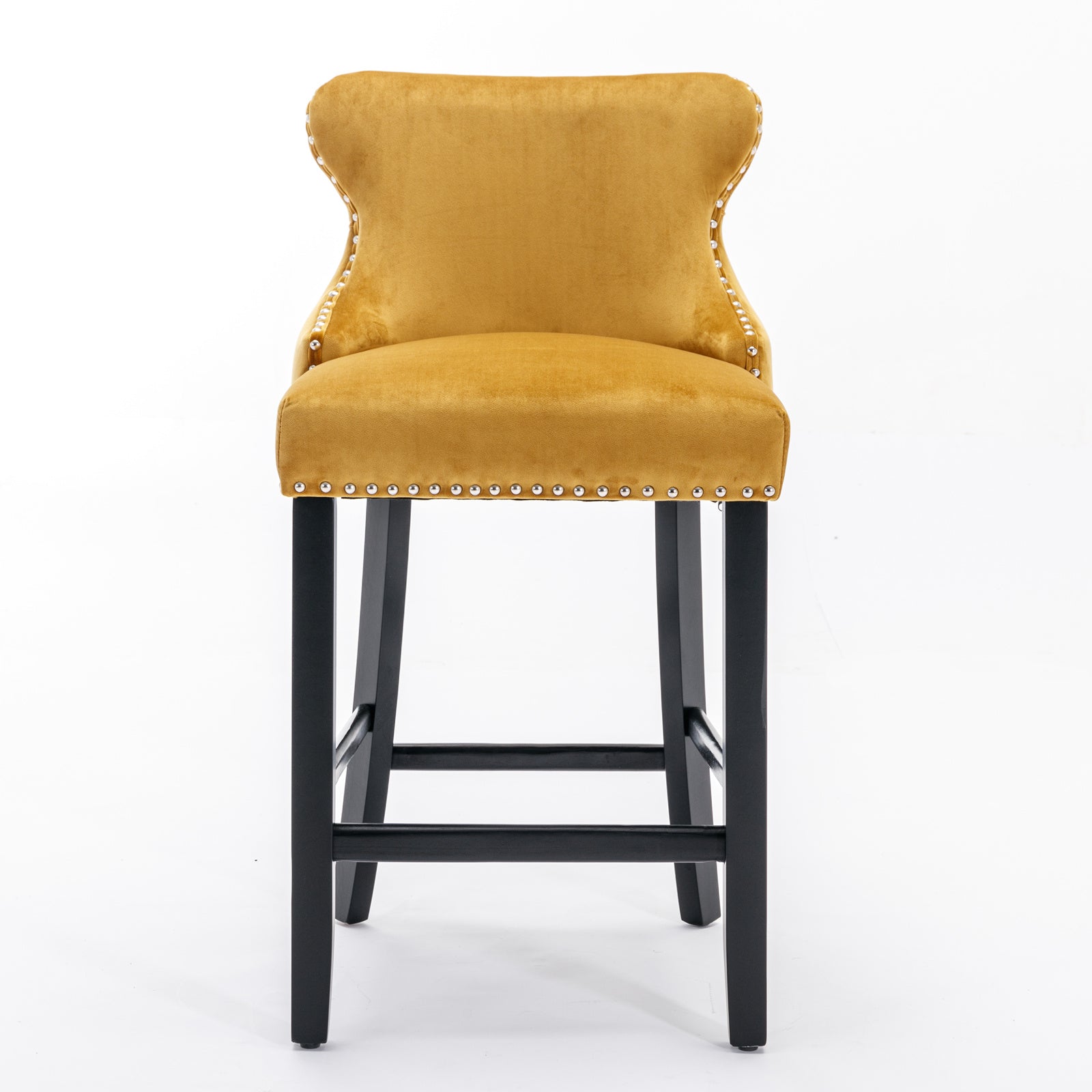 Ochre velvet bar stool with silver nailhead trim and black wooden legs