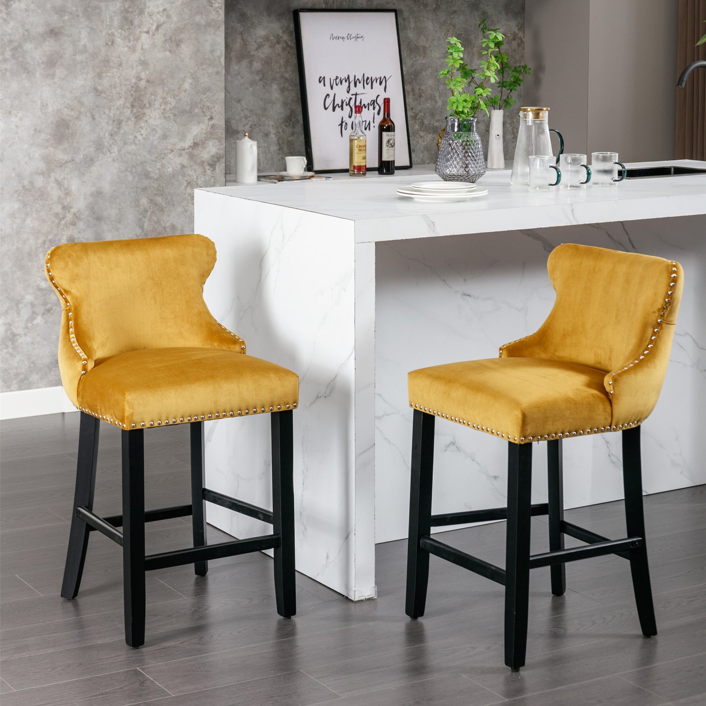 Yellow velvet counter stool with silver nailhead trim and black wooden legs