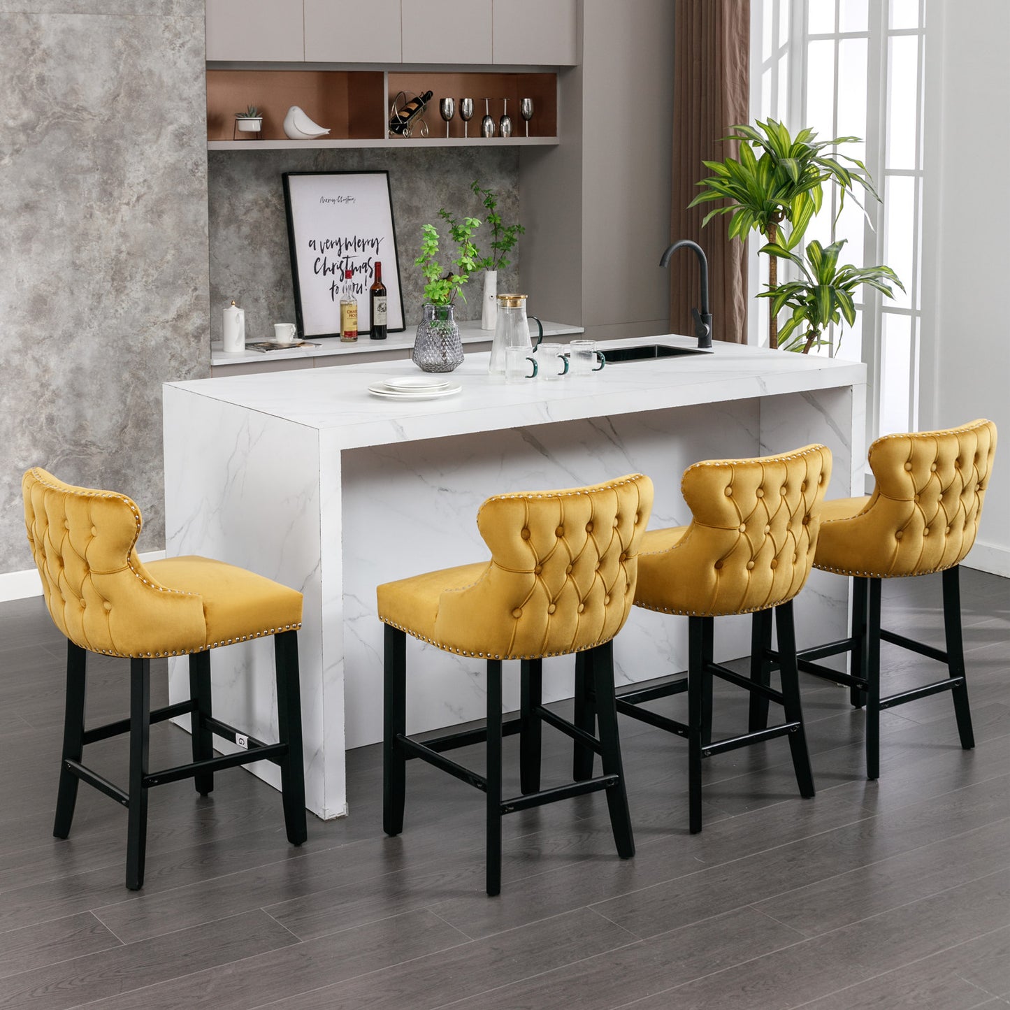 Yellow tufted velvet bar stools with silver nailhead trim and black legs