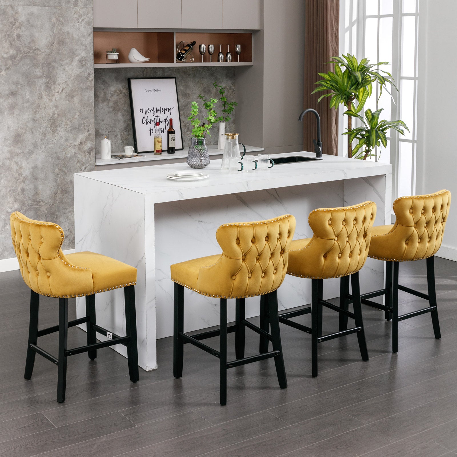 Yellow tufted velvet bar stools with silver nailhead trim and black legs