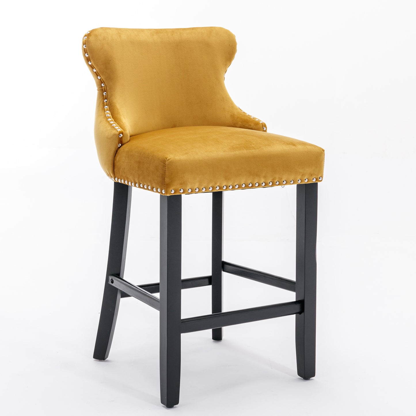Yellow velvet tufted bar stool with silver nailhead trim and dark wood legs