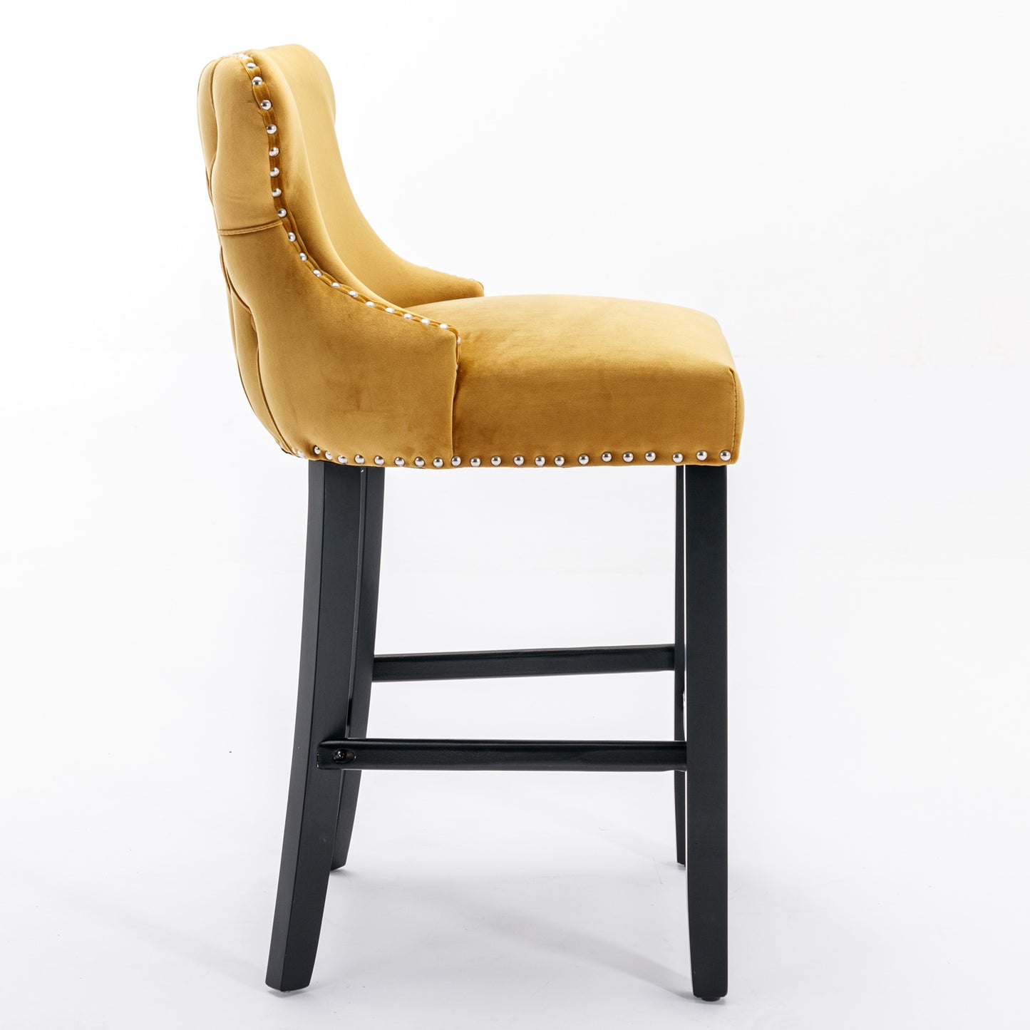 Yellow velvet tufted bar stool with silver nailhead trim and black legs