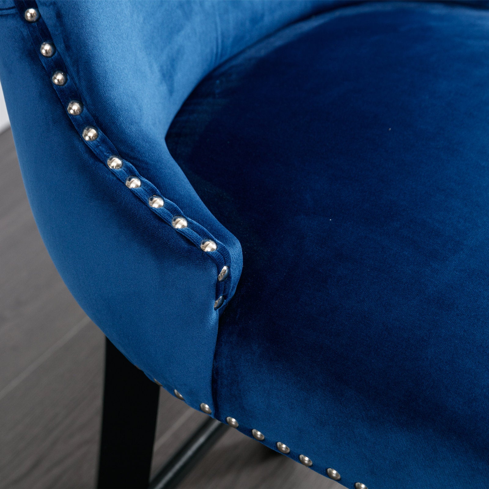 Deep blue velvet bar stool with silver stud detailing