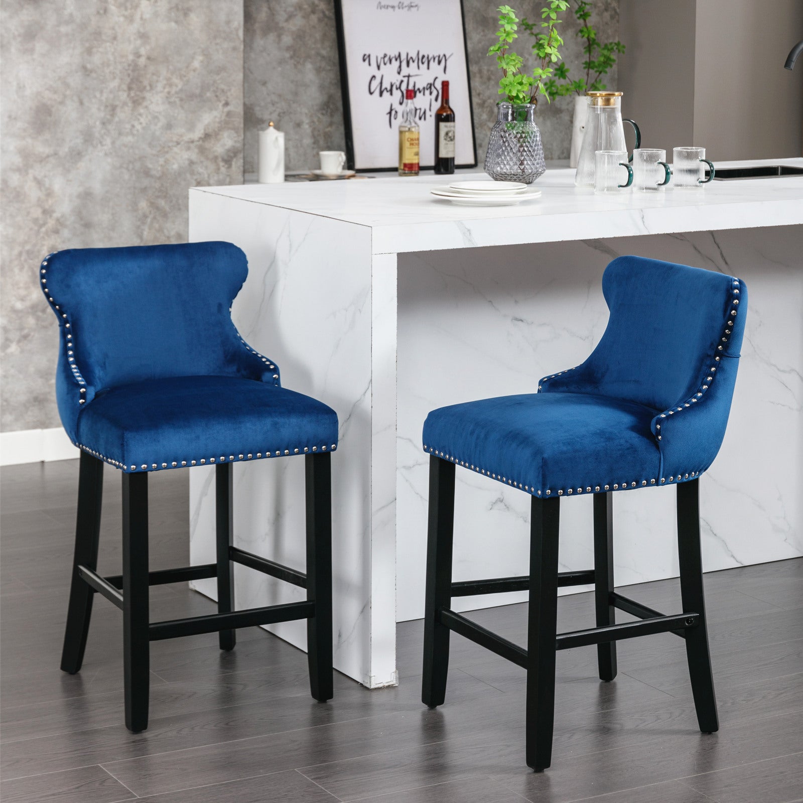 Royal blue velvet bar stool with silver nailhead trim and black legs