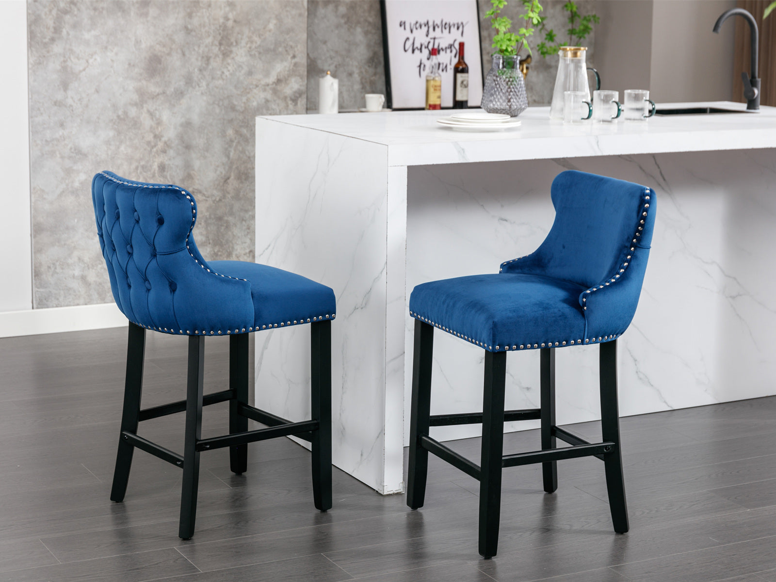Blue velvet bar stool with tufted back and silver nailhead trim