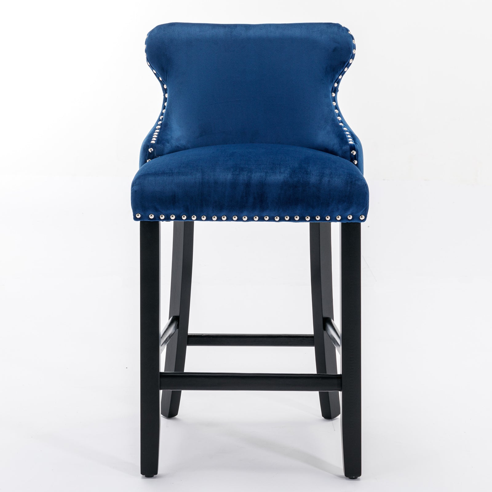 Deep blue velvet tufted bar stool with silver nailhead trim and black wooden legs