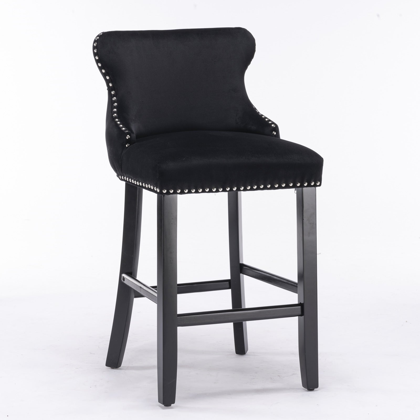 Black velvet tufted bar stool with silver nailhead trim