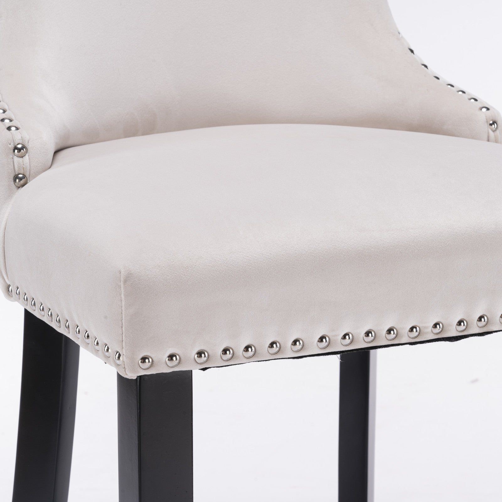 Cream velvet bar stool with silver nailhead trim and black legs