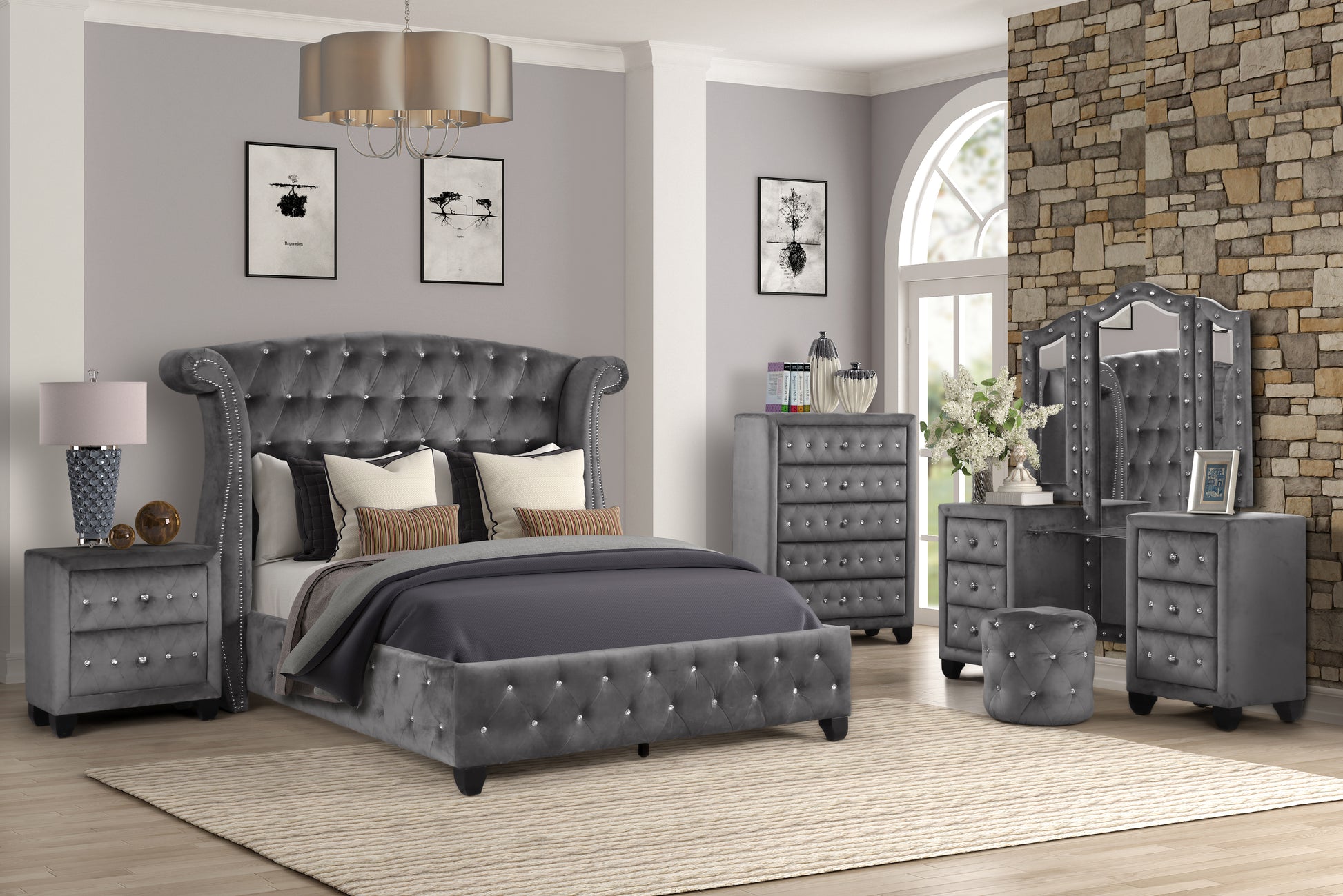 Gray velvet tufted king bed with crystal accents and plush pillows