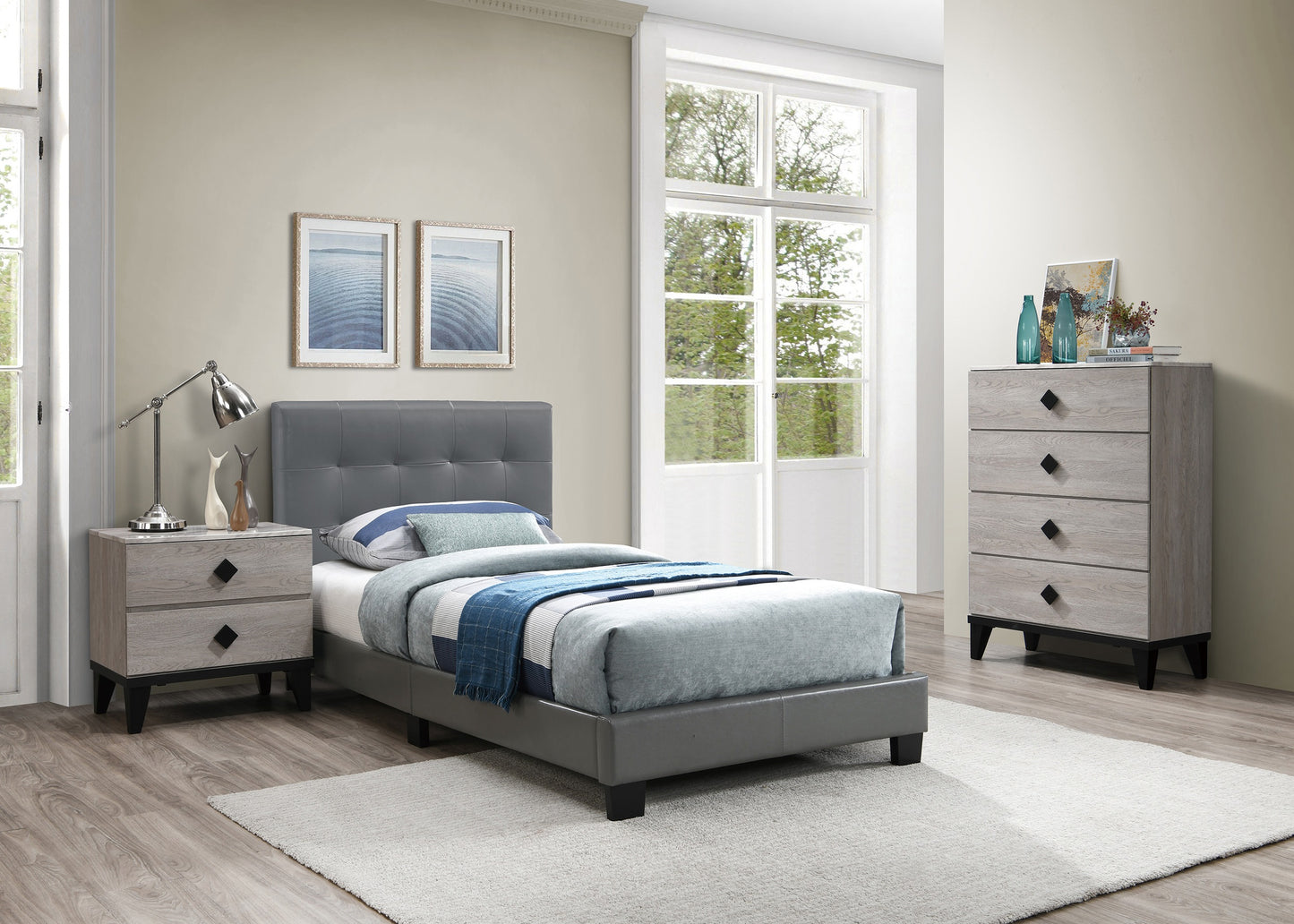 Gray faux leather twin bed with plush blue bedding