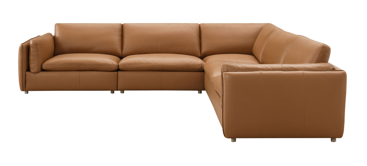 Luxurious tan leather sectional sofa with plush cushions and modern metal legs