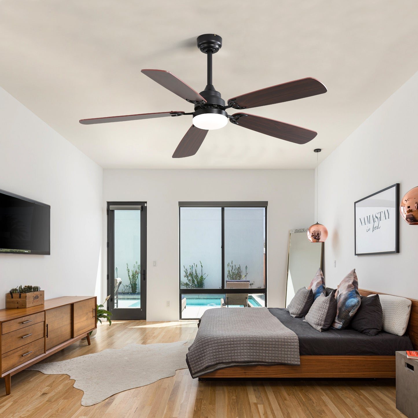 Modern black ceiling fan with five dark wood blades and integrated LED light