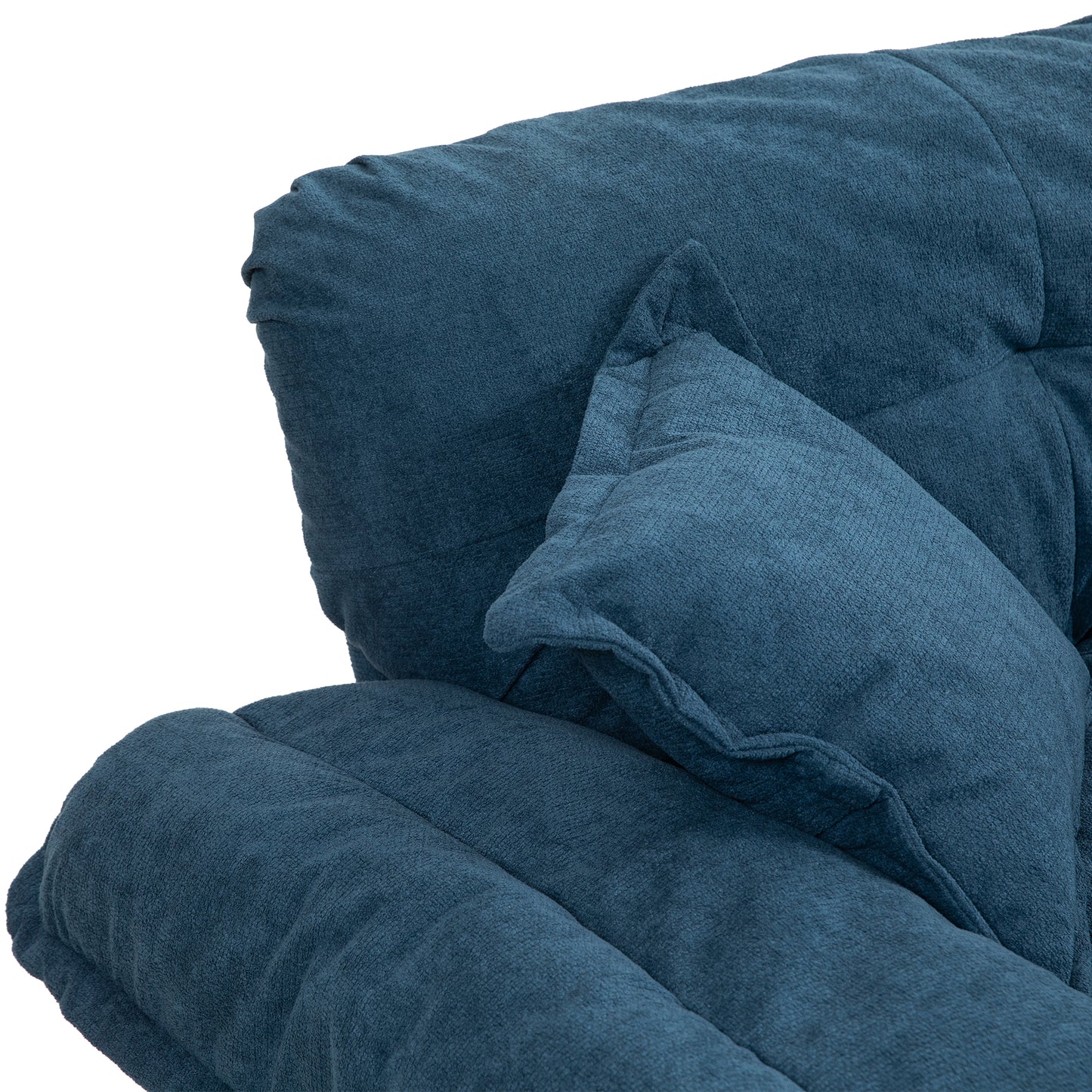 Textured navy blue plush fabric on a comfortable sofa detail