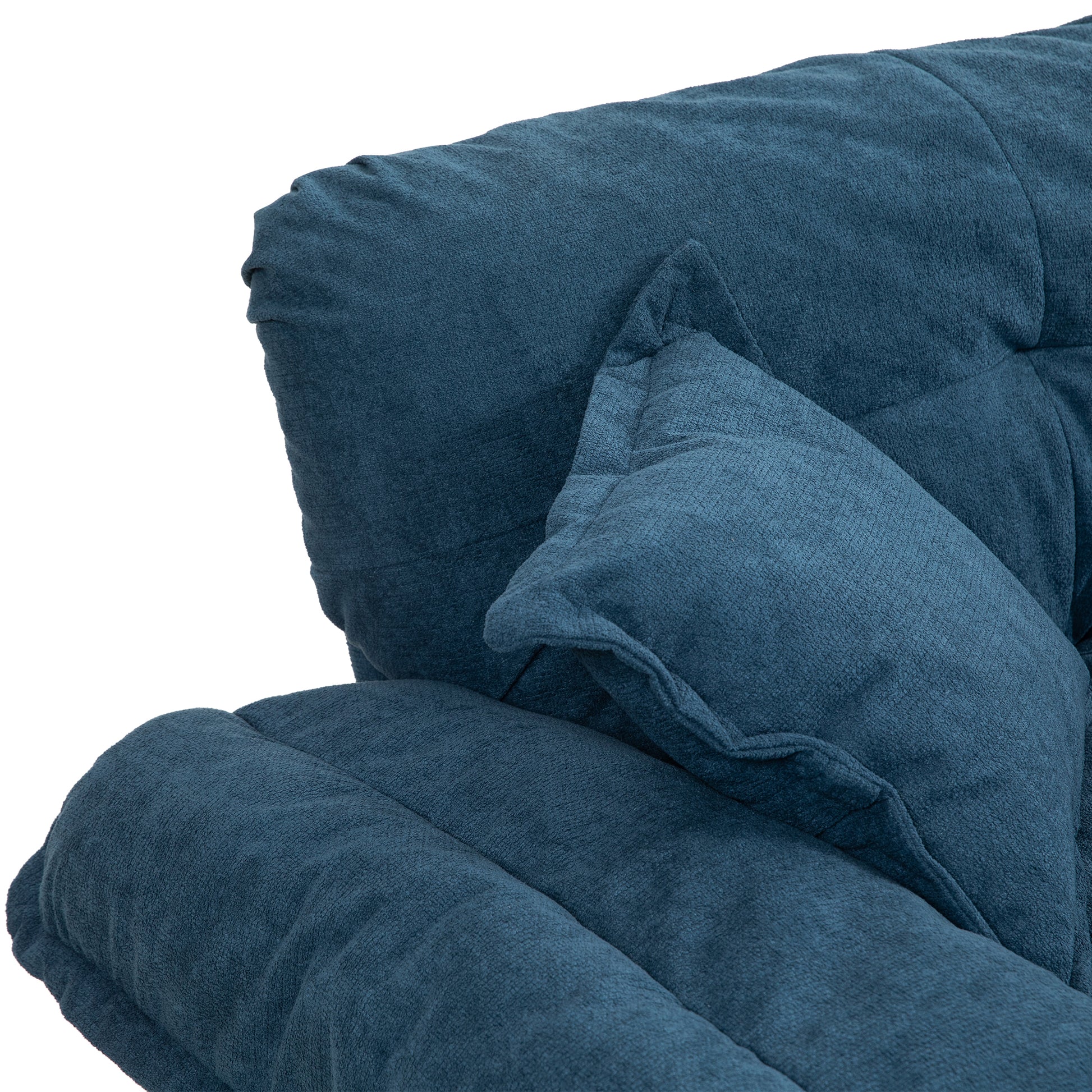 Textured navy blue plush fabric on a comfortable sofa detail