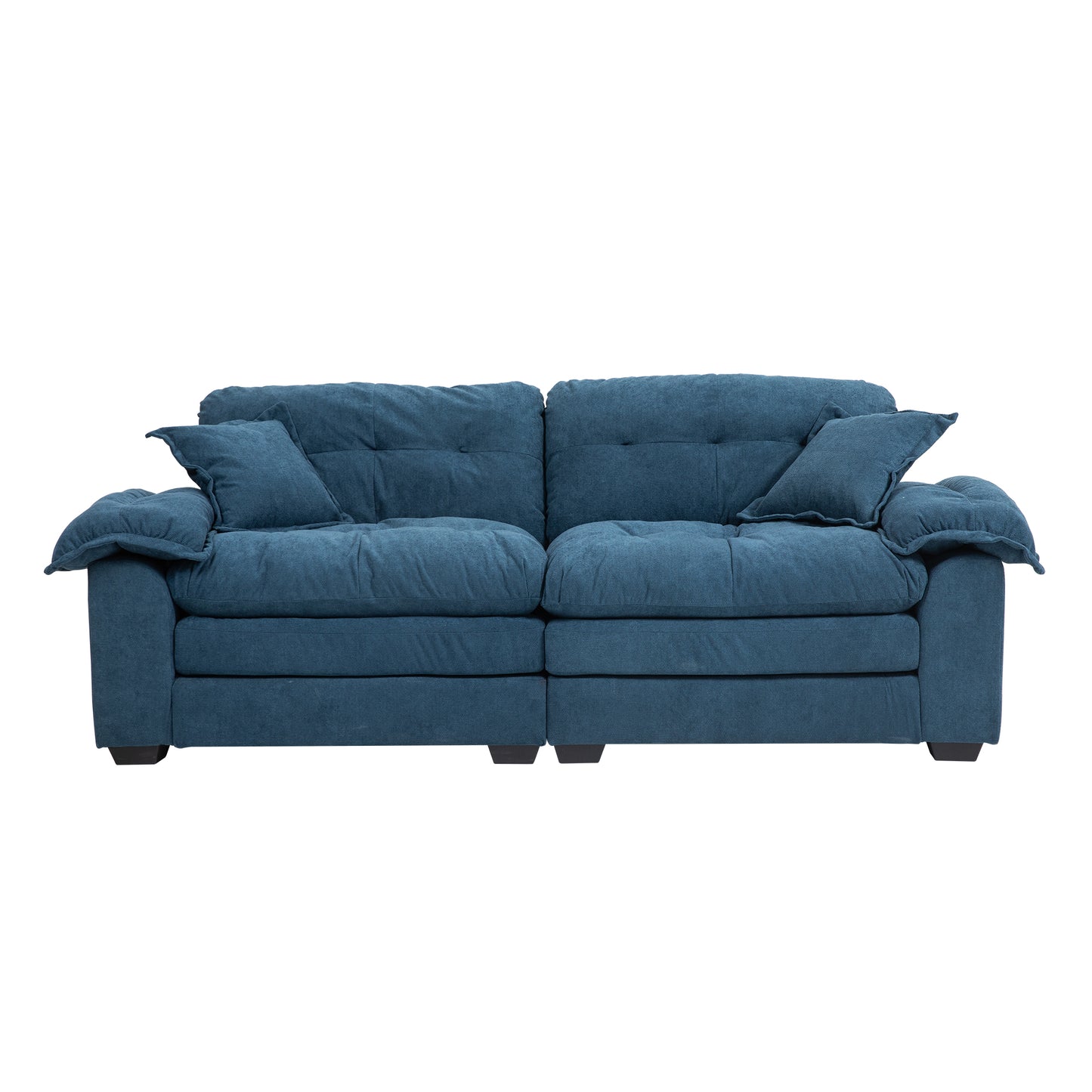 Comfortable blue fabric sofa with plush cushions and tufted backrest