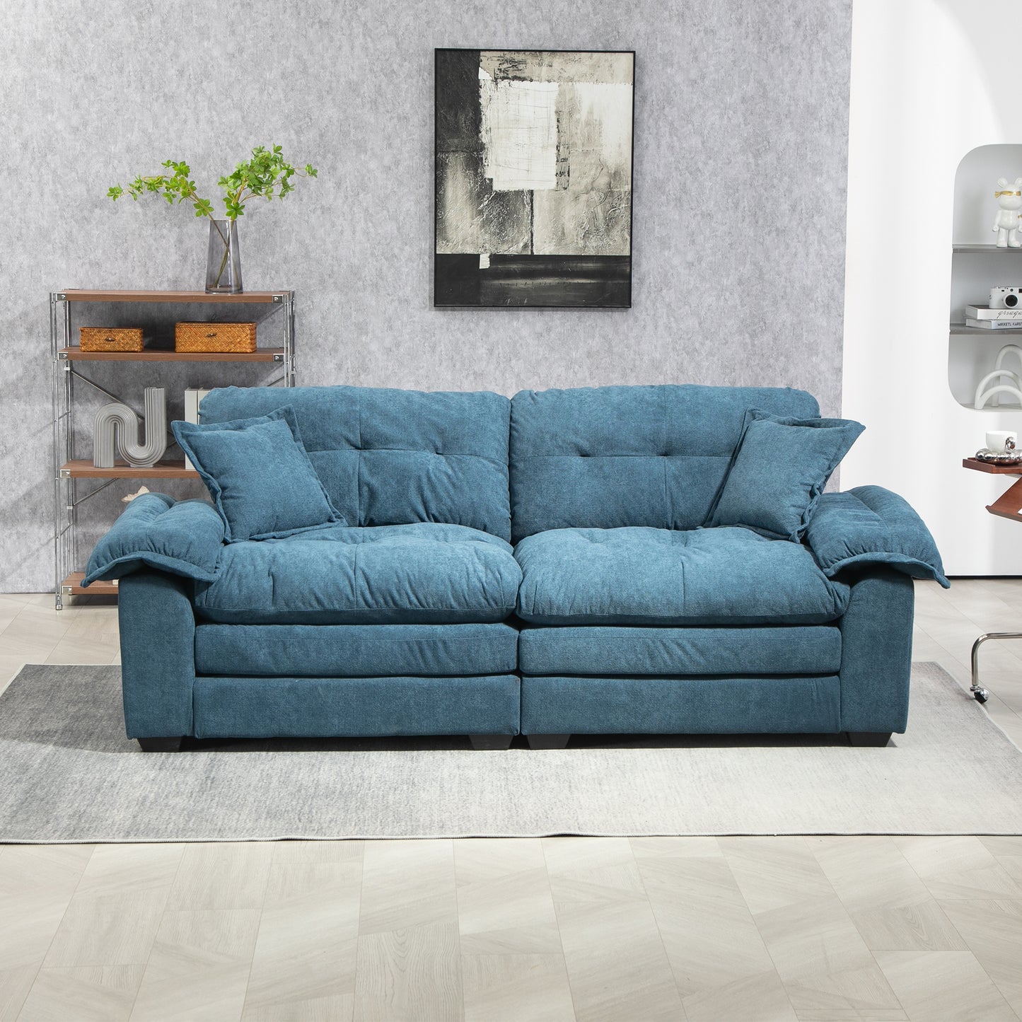 Plush teal chenille sofa with deep tufted cushions and plush armrests