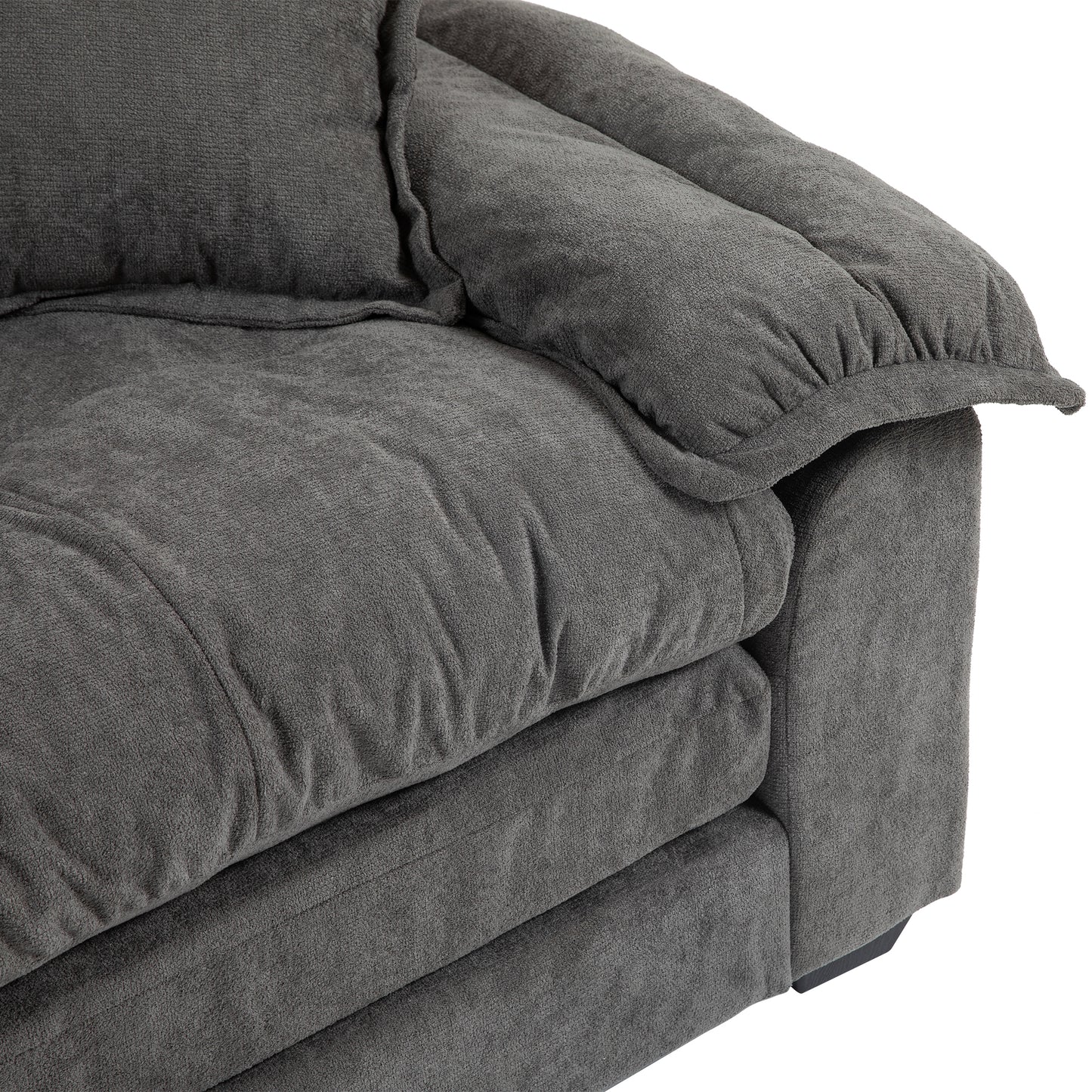 Plush charcoal grey fabric sofa armrest with textured cushions perfect for modern living rooms