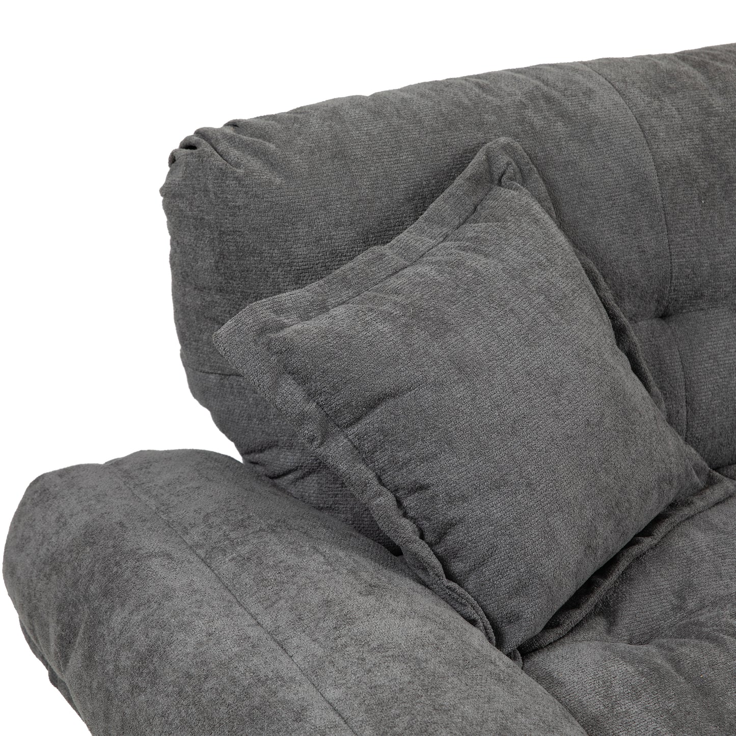Closeup of a plush grey fabric sofa with a matching throw pillow offering comfort