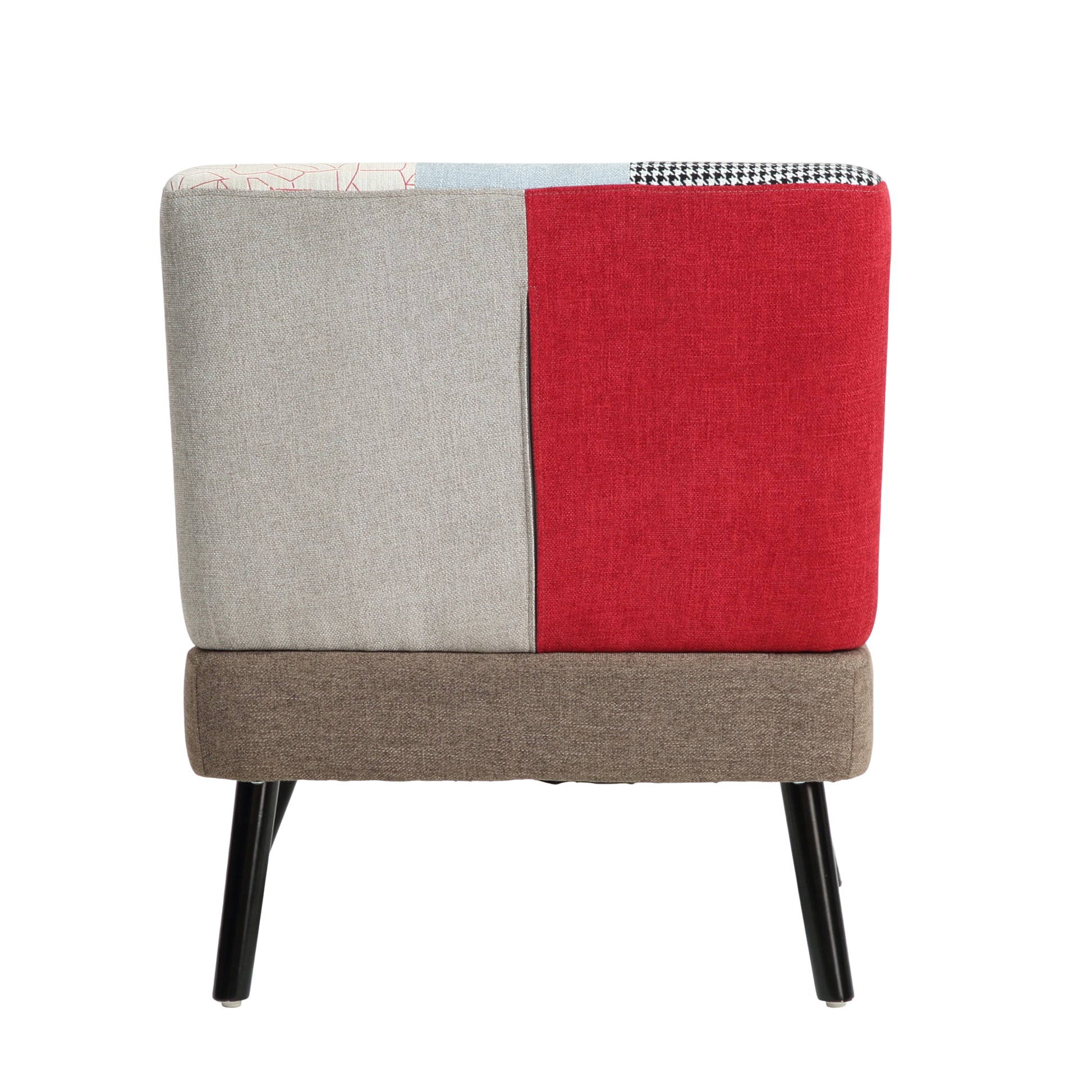 Patchwork armchair with grey red and patterned fabric panels on a white background
