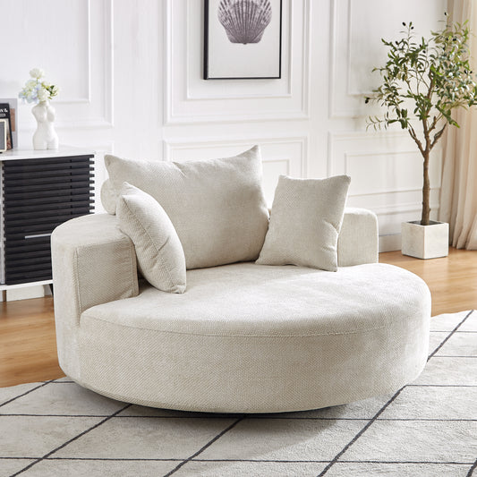 Cream textured swivel chair with round barrel design and plush accent pillows