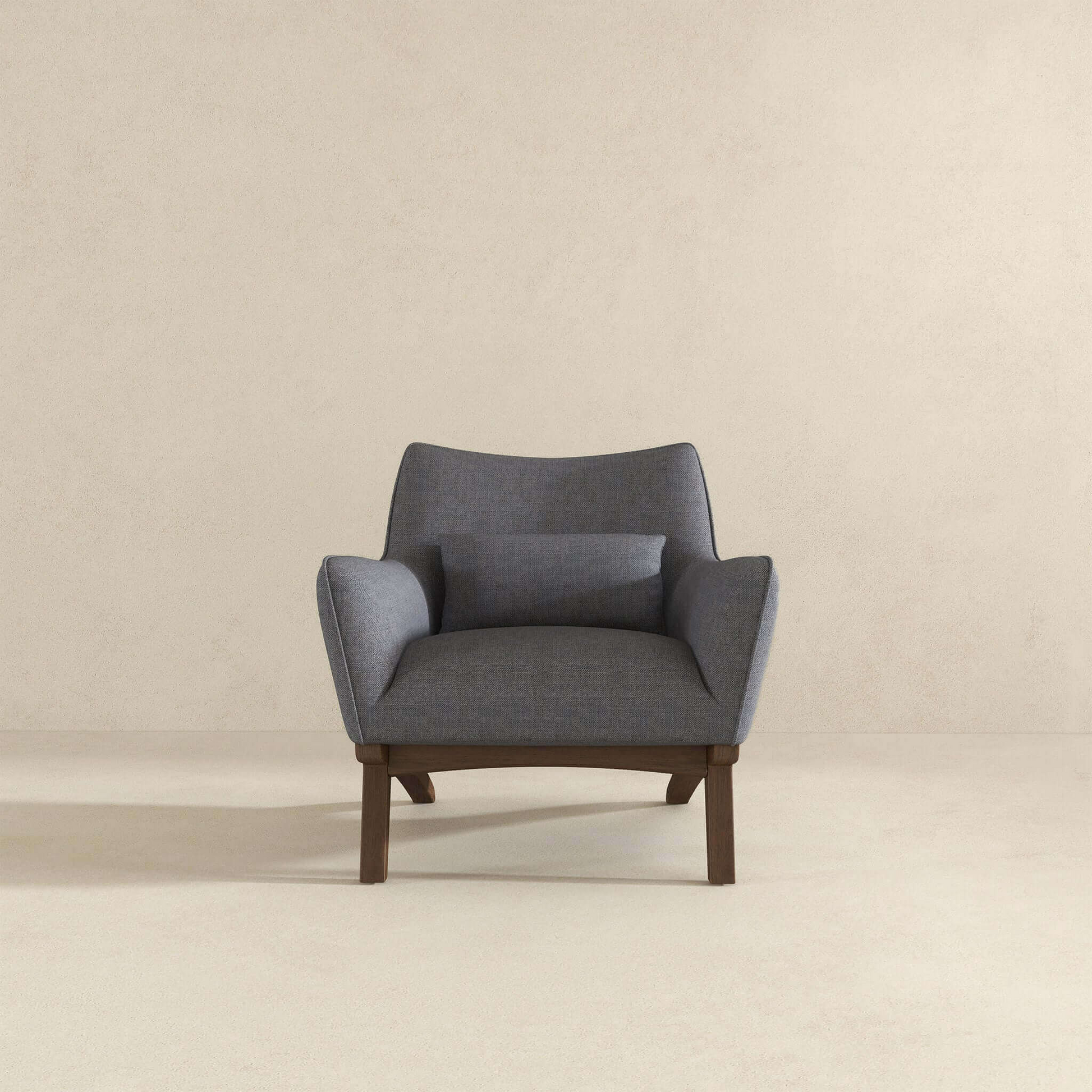 Modern gray fabric armchair with wood legs and accent pillow  chars
