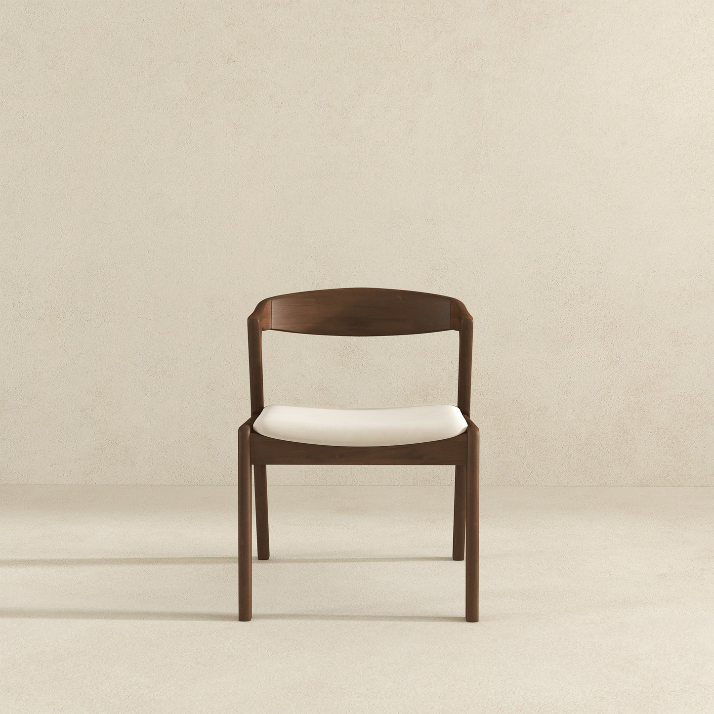 Modern dark wood dining chair with a natural white upholstered seat for versatile home decor