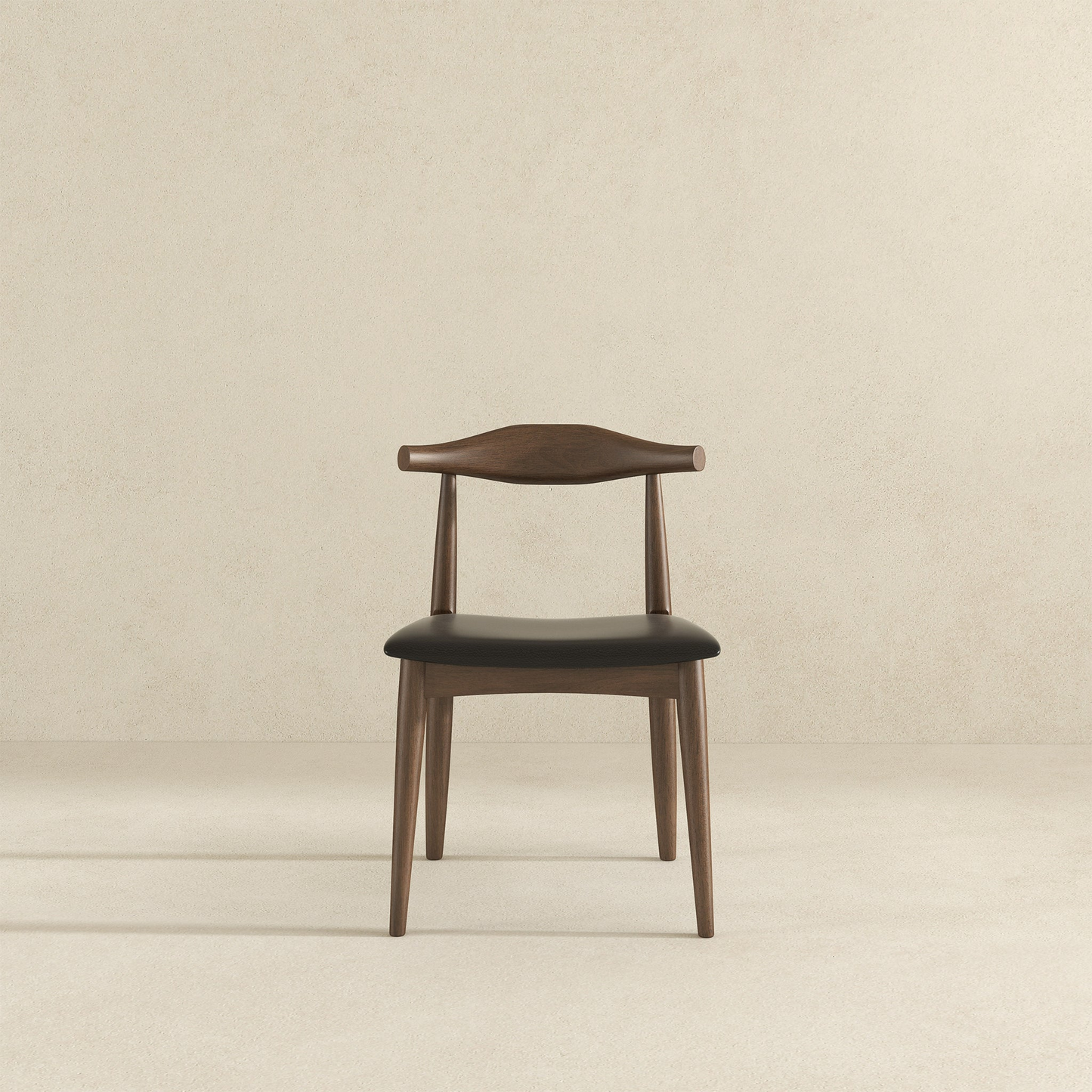 Dark wood dining chair with black upholstered seat and curved backrest