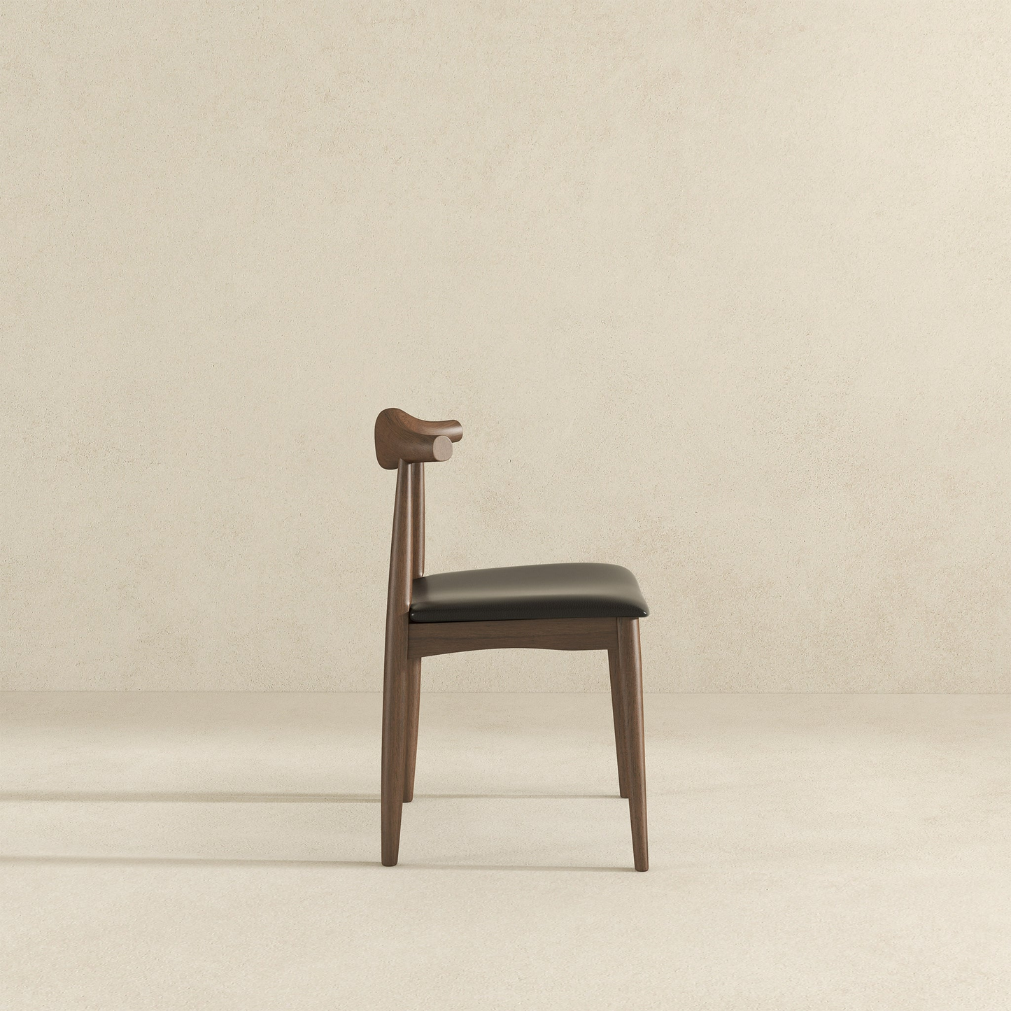 Modern wooden dining chair with black faux leather seat curved backrest