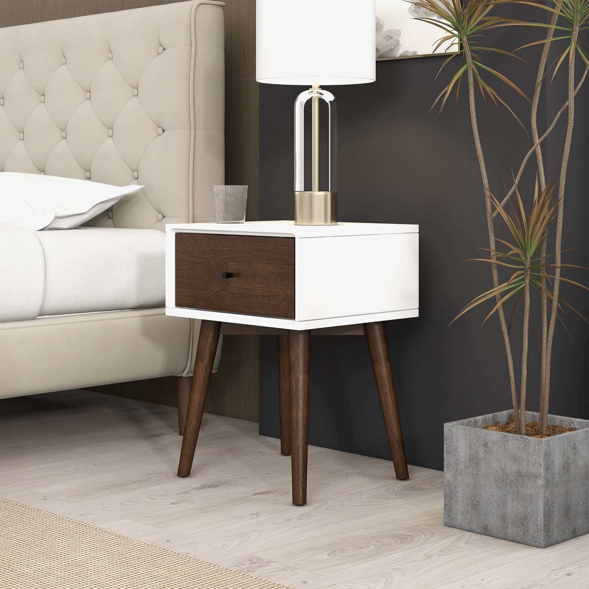 White and wood bedside table with tapered legs
